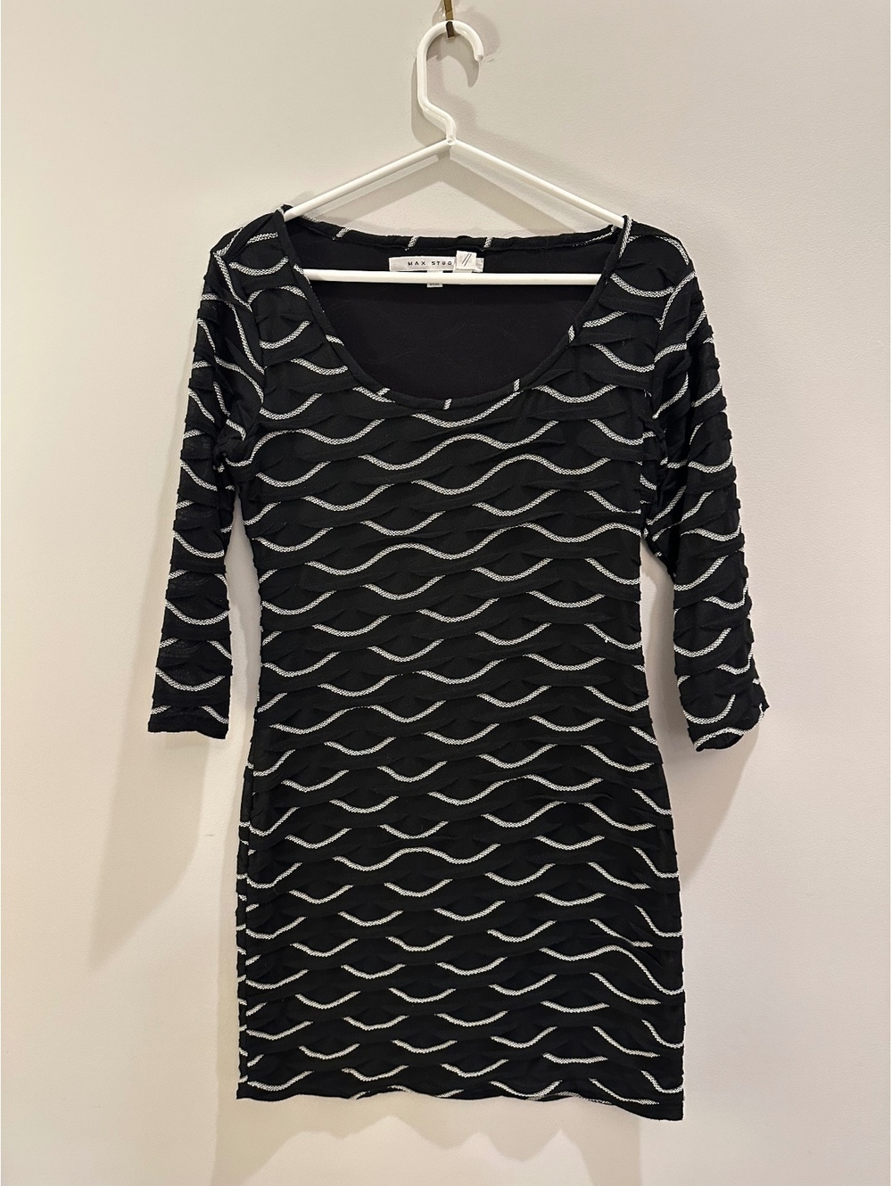 Small Max Studio scalloped knit dress featuring a black and white wavy pattern